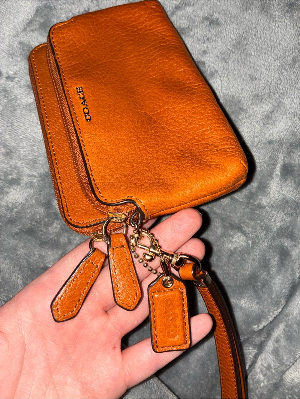 Coach Orange Leather Zip Wrist Wallet with Gold-Tone Accents